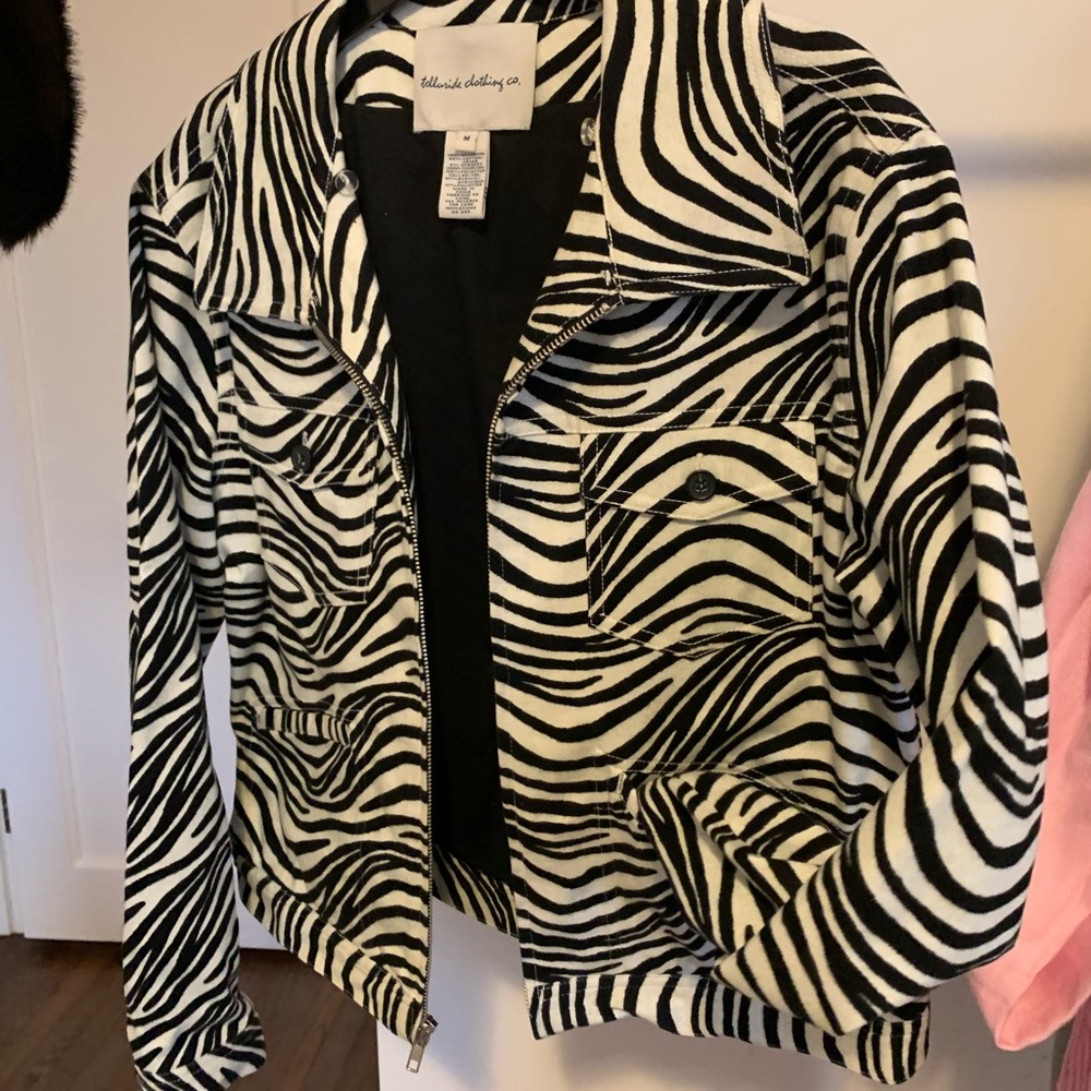 Zebra print Jacket with removable faux fur color.